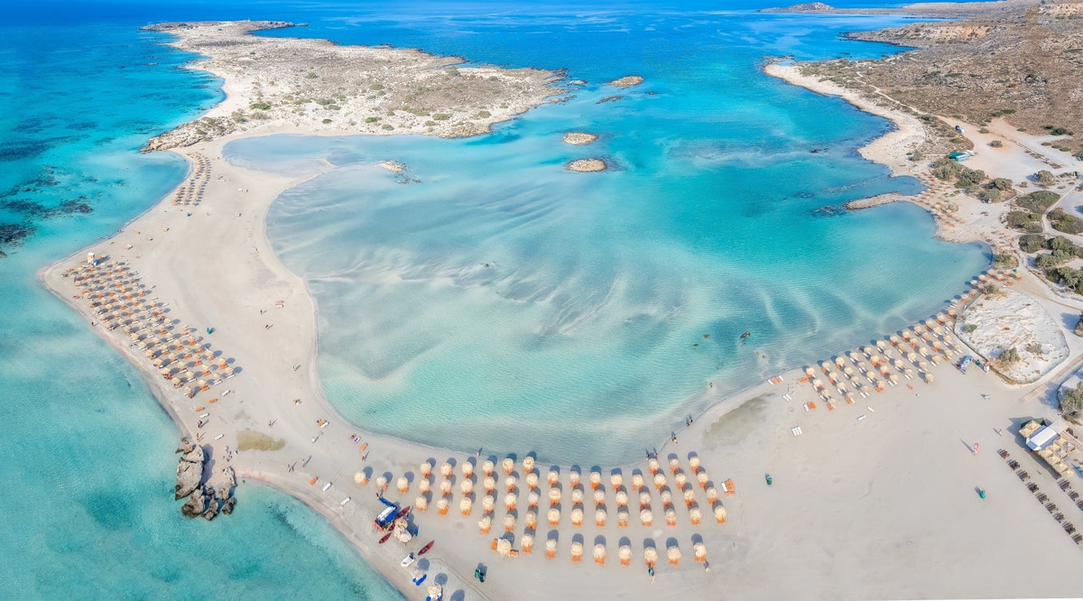 Stunning quiet beach in Crete, Greece with sky blue coloured water