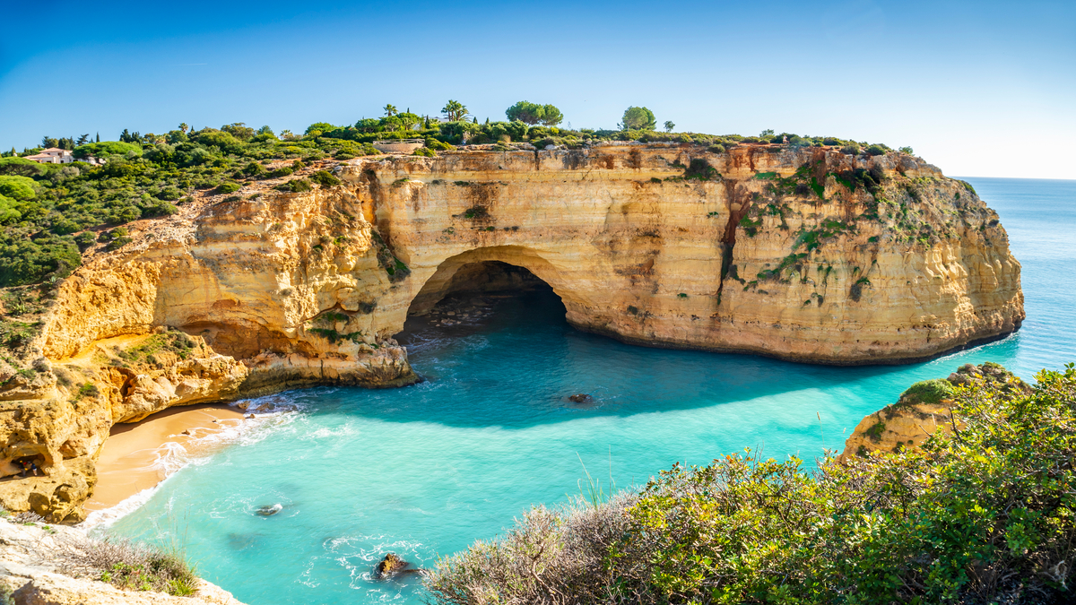stupendous rock formation opening in the ocean in the Algarve