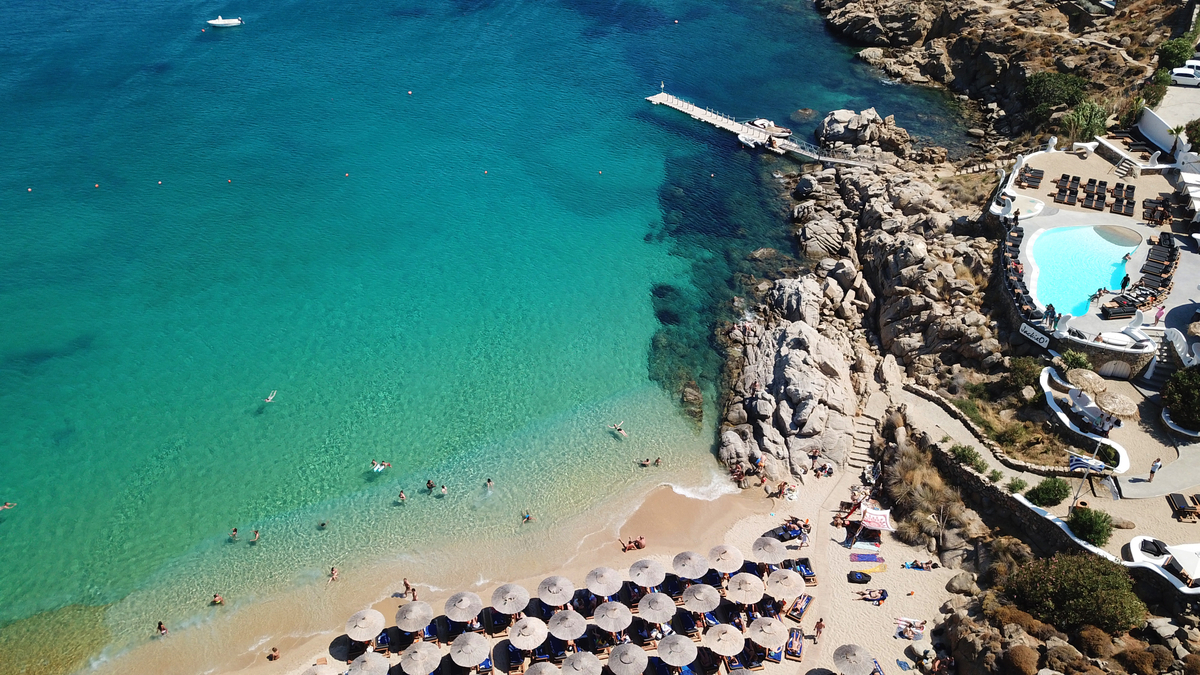 Luxury hotel placed on the beach in Mykonos with a pool